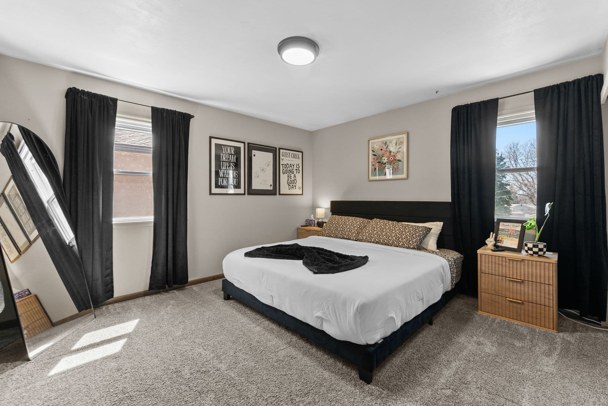 Calm, bright bedroom with a king bed